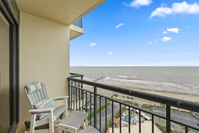 5220 Seawall Blvd Unit 1536/37, Galveston, TX 77551 - balcony featuring view of water and beach
