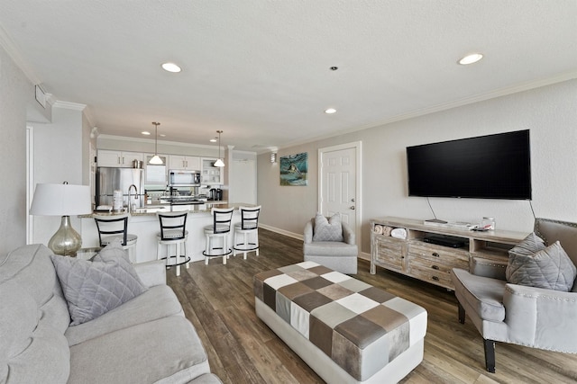 5220 Seawall Blvd Unit 1536/37, Galveston, TX 77551 - living room with crown molding, dark wood-style floors, and recessed lighting