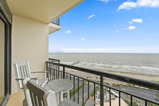 5220 Seawall Blvd Unit 1536/37, Galveston, TX 77551 - balcony featuring view of water and beach