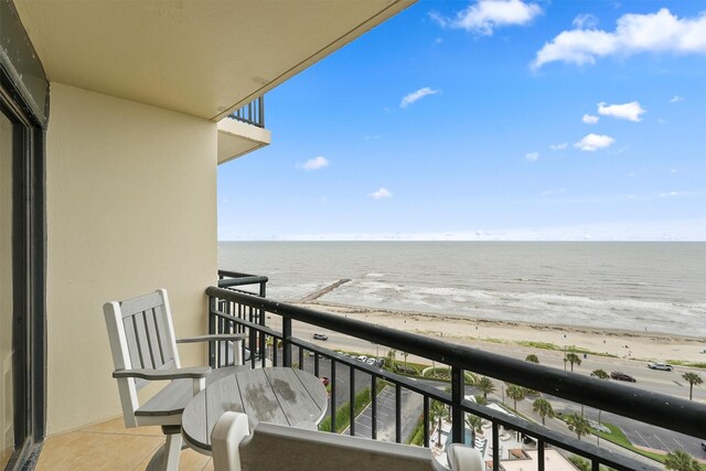 5220 Seawall Blvd Unit 1536/37, Galveston, TX 77551 - balcony featuring view of water and beach