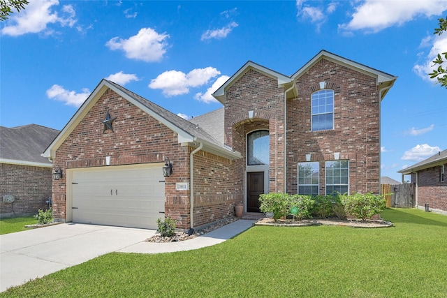 view of front property with a garage and a front yard