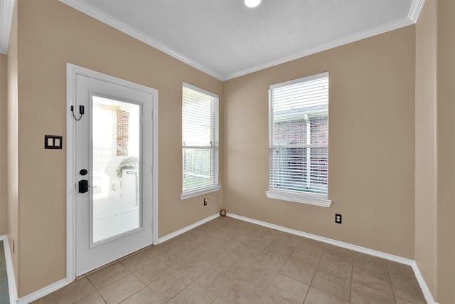 entryway with light tile patterned floors and ornamental molding