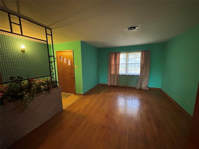 6402 Jim St, Houston, TX 77092 - unfurnished room with wood finished floors and baseboards