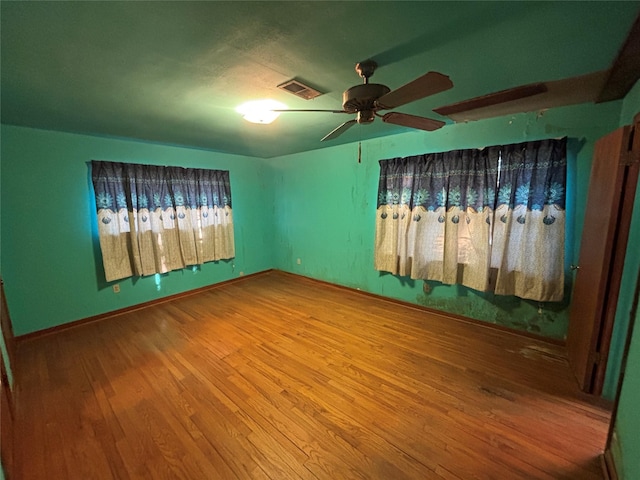 6402 Jim St, Houston, TX 77092 - spare room with wood finished floors and a ceiling fan