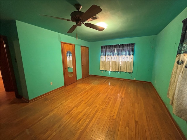 6402 Jim St, Houston, TX 77092 - empty room featuring wood finished floors and a ceiling fan