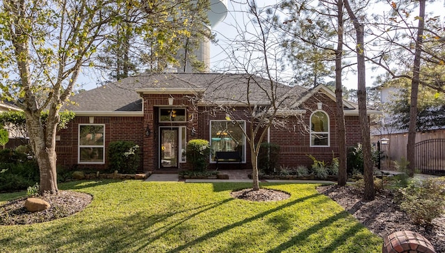 view of front facade with a front yard