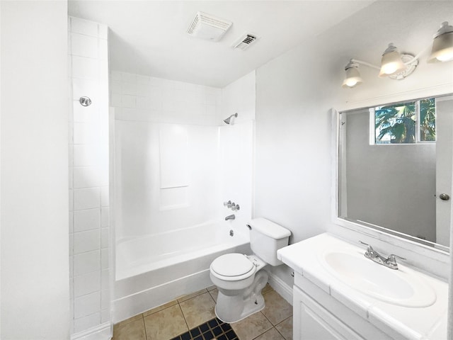 full bathroom with tile patterned floors, washtub / shower combination, vanity, and toilet