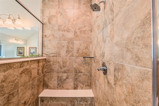 bathroom featuring tiled shower