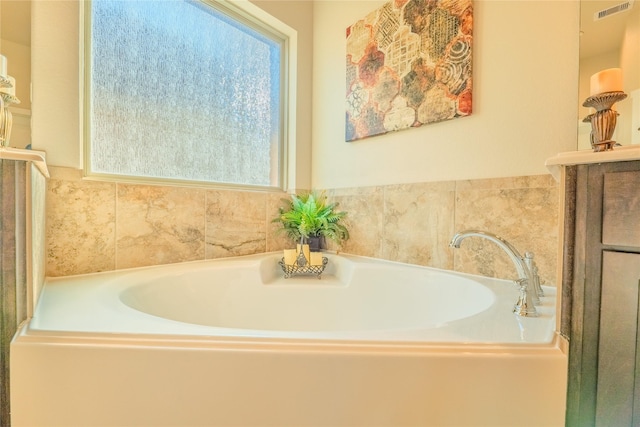 bathroom with a bathing tub