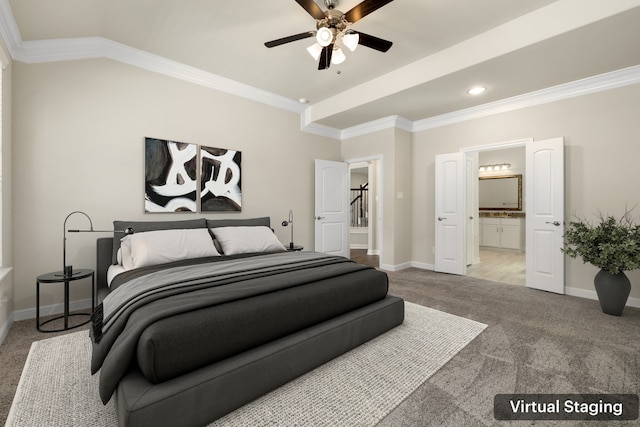 carpeted bedroom featuring connected bathroom, ceiling fan, and ornamental molding