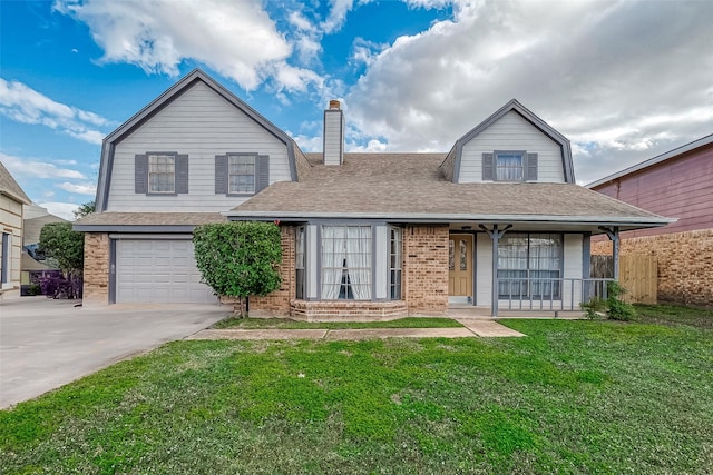 view of front of home featuring a porch, a garage, and a front lawn