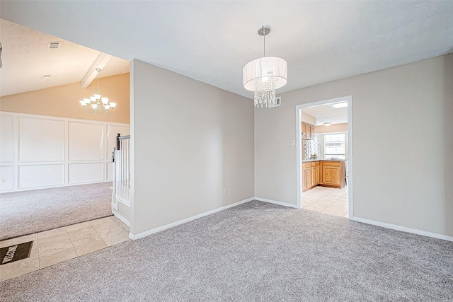 empty room featuring a notable chandelier, vaulted ceiling with beams, and light colored carpet