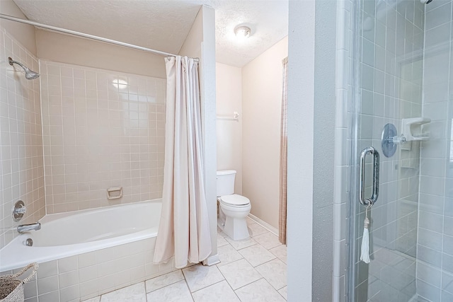 bathroom with a shower with shower curtain, tile patterned floors, a textured ceiling, and toilet