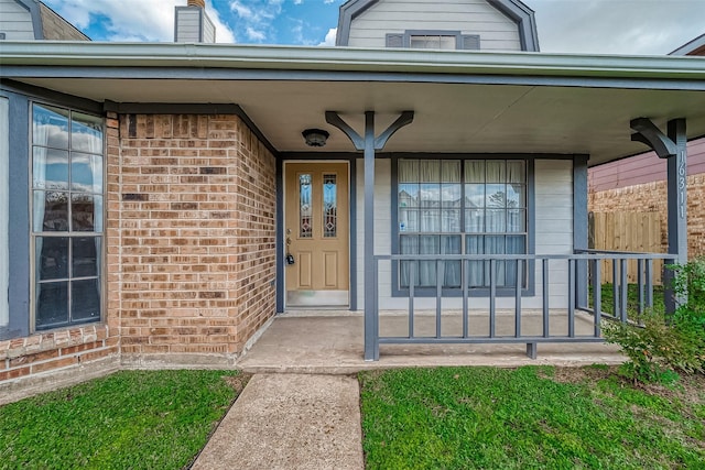 entrance to property with a porch