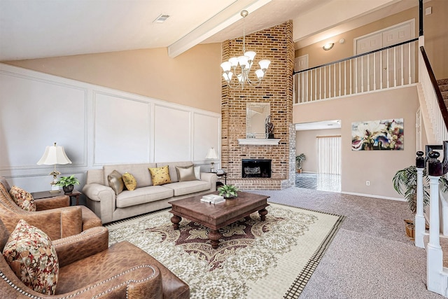 carpeted living room featuring beam ceiling, a fireplace, high vaulted ceiling, and a notable chandelier