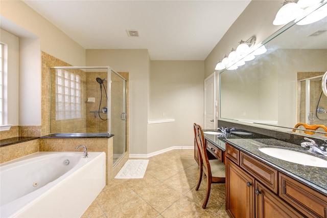 bathroom with tile patterned floors, plus walk in shower, and vanity