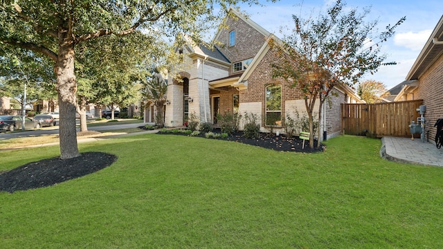 view of front facade with a front lawn