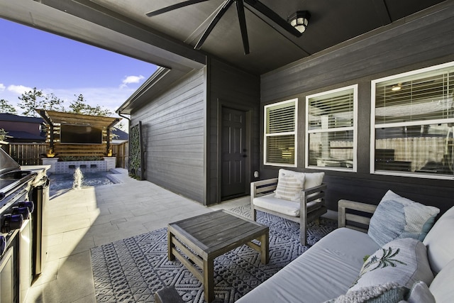 view of patio with an outdoor hangout area and ceiling fan