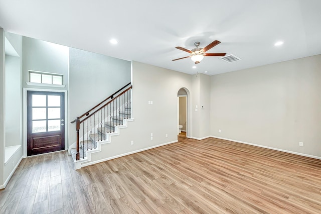 unfurnished room featuring light hardwood / wood-style flooring and ceiling fan