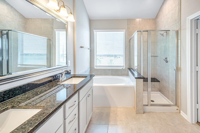 bathroom featuring tile patterned floors, plenty of natural light, plus walk in shower, and vaulted ceiling