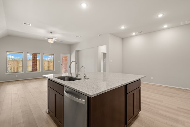 kitchen featuring ceiling fan, dishwasher, sink, light stone counters, and dark brown cabinets