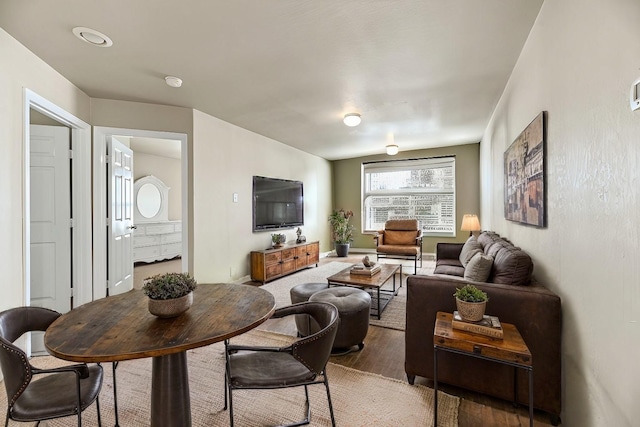 living room with wood-type flooring