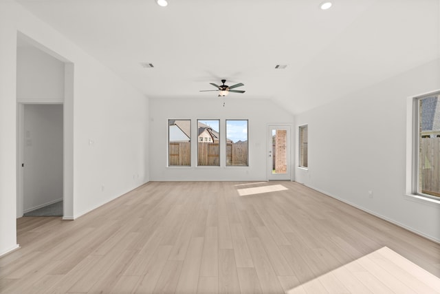 unfurnished living room with ceiling fan, light hardwood / wood-style floors, and lofted ceiling