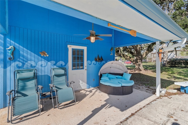 view of patio featuring ceiling fan