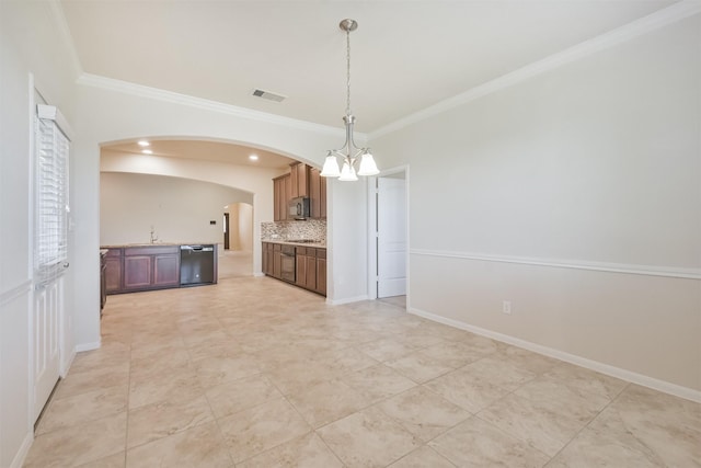 kitchen with dishwashing machine, crown molding, backsplash, and decorative light fixtures