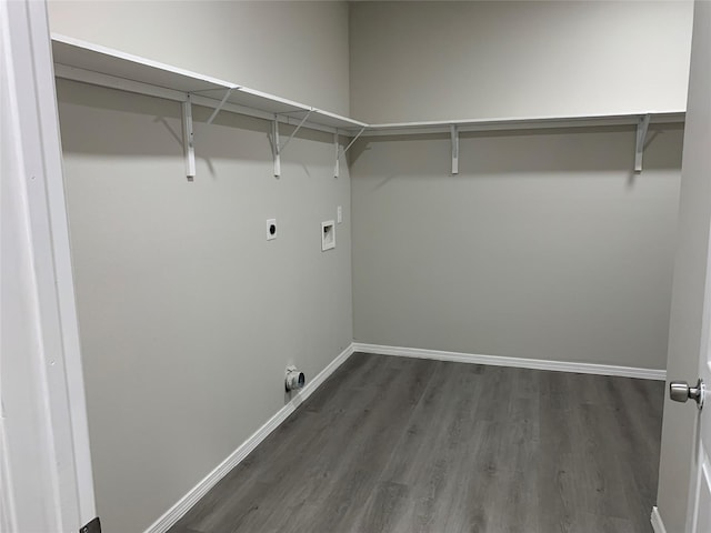 washroom featuring hookup for a washing machine, dark wood-type flooring, and hookup for an electric dryer