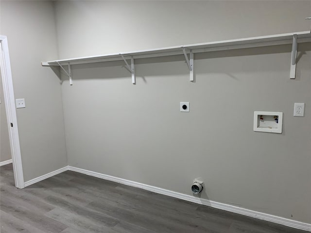 clothes washing area featuring hookup for an electric dryer, washer hookup, and dark wood-type flooring