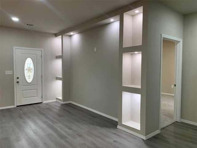 foyer with light wood-type flooring