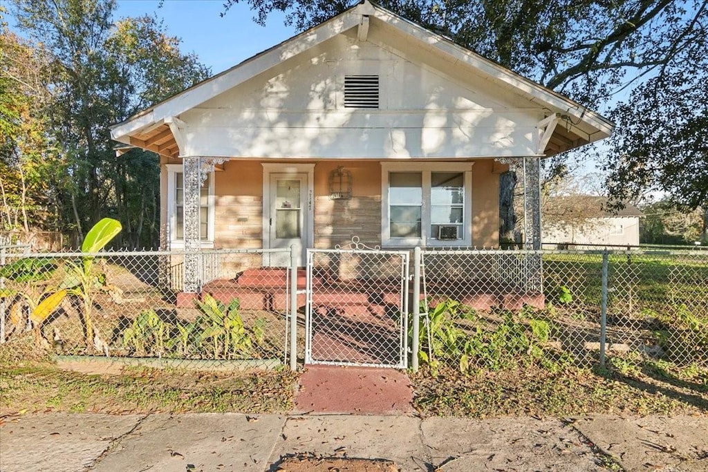 bungalow-style home featuring covered porch