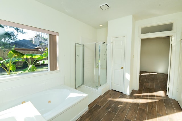 bathroom with independent shower and bath