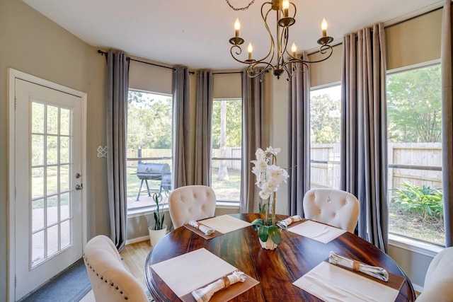 dining area featuring a chandelier