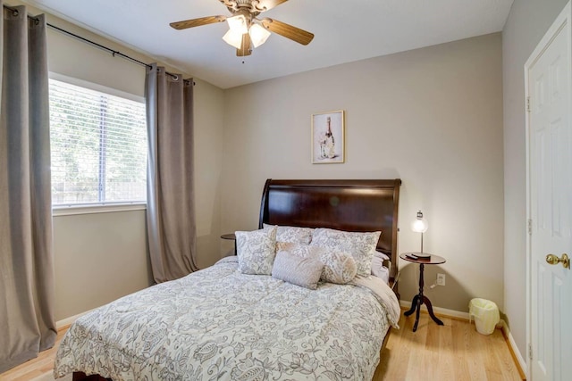 bedroom featuring ceiling fan and light wood-type flooring