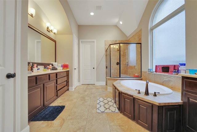 bathroom featuring separate shower and tub, tile patterned flooring, vanity, and lofted ceiling