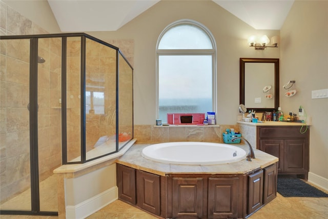 bathroom featuring tile patterned floors, vanity, plus walk in shower, and lofted ceiling