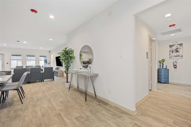 hallway featuring light hardwood / wood-style flooring