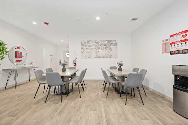 dining room featuring light hardwood / wood-style flooring