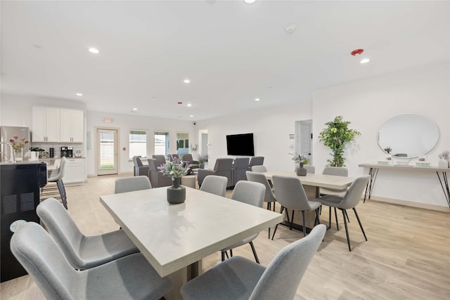 dining room featuring light hardwood / wood-style floors