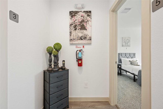 hall featuring hardwood / wood-style floors