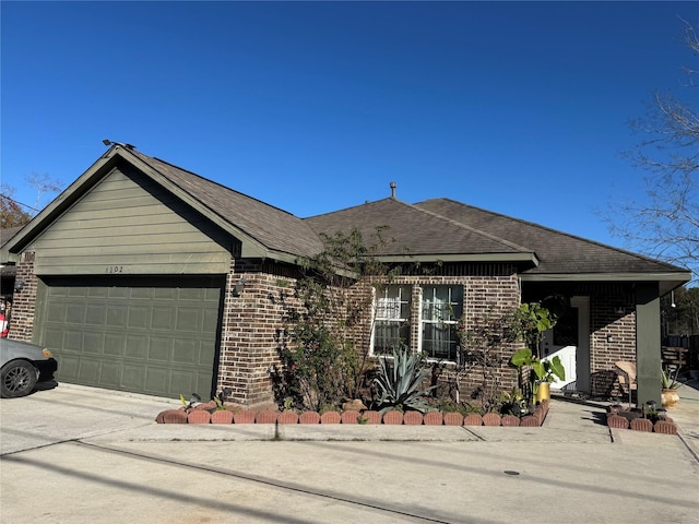 single story home featuring a garage