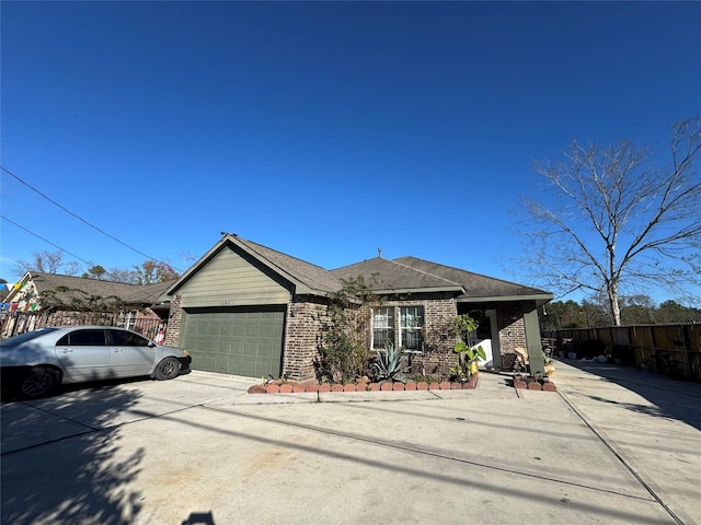 ranch-style house featuring a garage