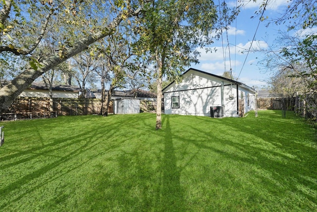 view of yard with central AC