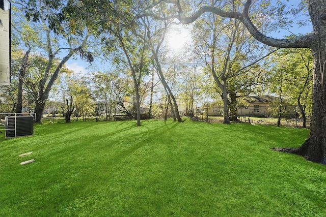 view of yard featuring central AC