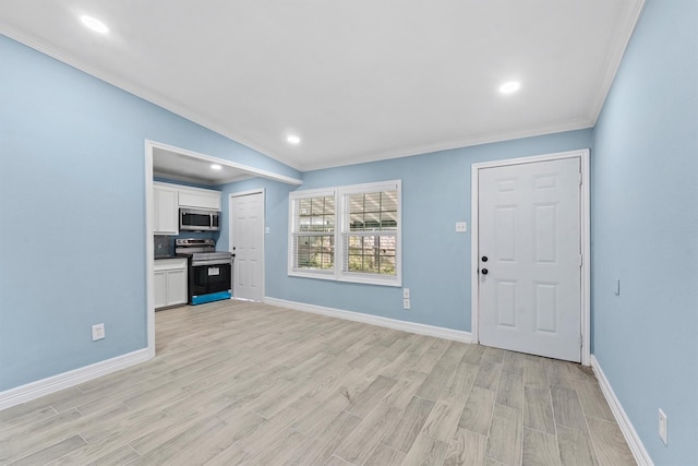 unfurnished living room with crown molding, light hardwood / wood-style floors, and lofted ceiling