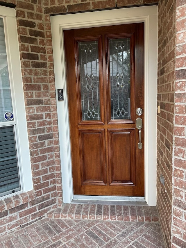 view of exterior entry with elevator