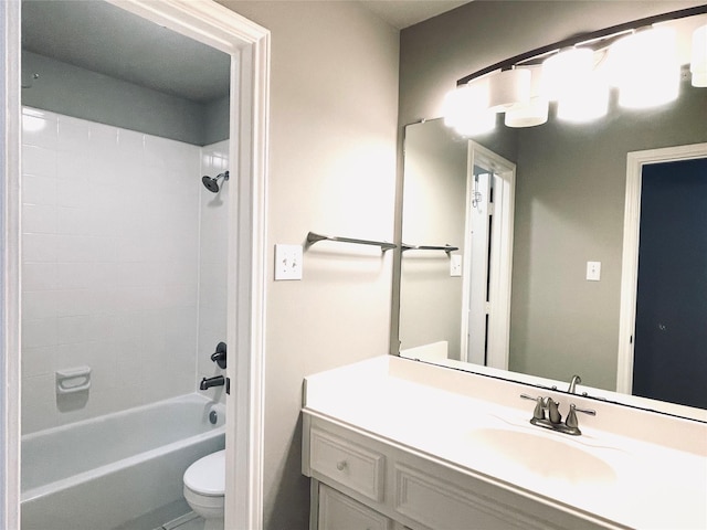 full bathroom featuring vanity,  shower combination, and toilet