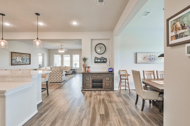 interior space featuring ceiling fan and wood-type flooring